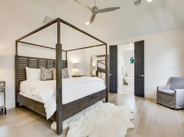 2000 Raleigh Ave, Austin, TX 78703 - bedroom featuring vaulted ceiling, light wood-style floors, ensuite bathroom, recessed lighting, and a ceiling fan