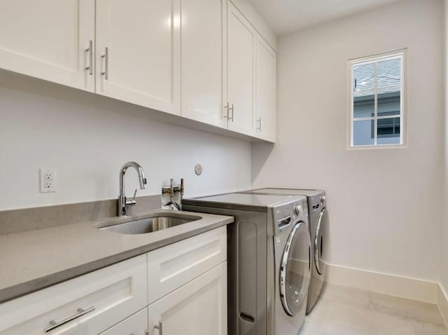 2000 Raleigh Ave, Austin, TX 78703 - washroom with cabinet space and washing machine and dryer