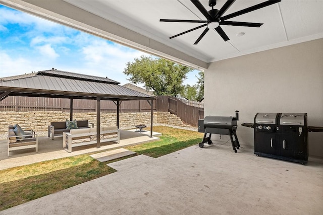 124 Adina Dr, Dripping Springs, TX 78620 - fenced backyard featuring a gazebo, an outdoor hangout area, a patio area, ceiling fan, and a grill