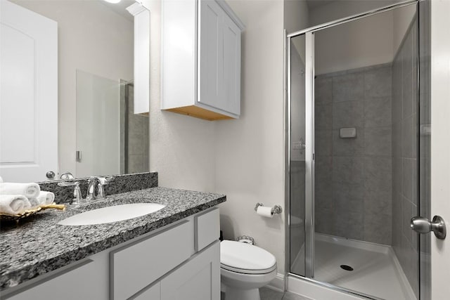 124 Adina Dr, Dripping Springs, TX 78620 - bathroom featuring toilet, vanity, and a shower stall