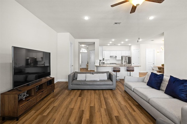 124 Adina Dr, Dripping Springs, TX 78620 - living area featuring a ceiling fan, wood finished floors, recessed lighting, and baseboards