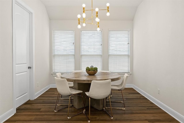 124 Adina Dr, Dripping Springs, TX 78620 - dining room featuring a chandelier, baseboards, healthy amount of natural light, dark wood-style flooring, and lofted ceiling