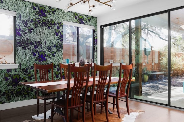 4420 Mount Vernon Dr Unit A, Austin, TX 78745 - dining space featuring wood finished floors and a chandelier