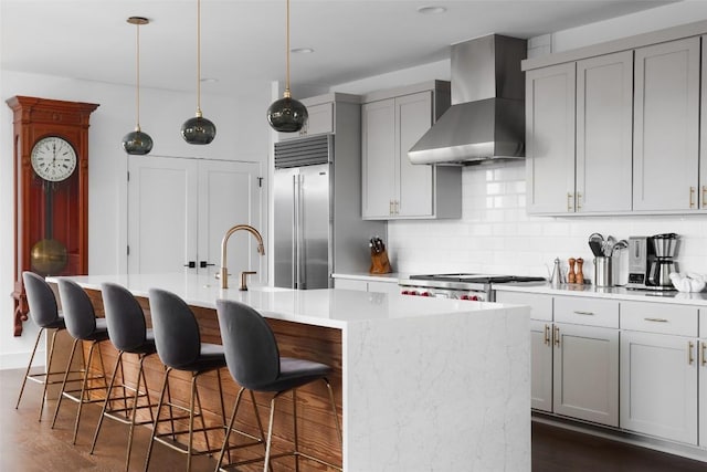 4420 Mount Vernon Dr Unit A, Austin, TX 78745 - kitchen with stainless steel built in refrigerator, wall chimney exhaust hood, a sink, a kitchen island with sink, and tasteful backsplash