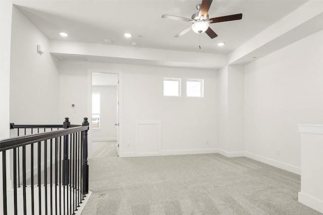 2035 Cora Ivy Loop, Round Rock, TX 78665 - unfurnished room with light colored carpet, a ceiling fan, recessed lighting, and baseboards
