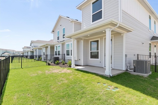 2035 Cora Ivy Loop, Round Rock, TX 78665 - back of property featuring cooling unit and a patio