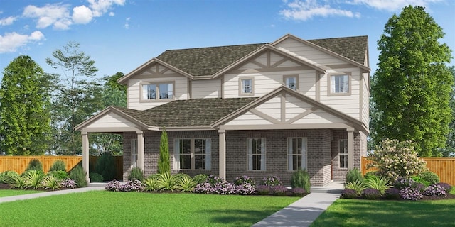 9504 Grapevine Leaf Dr, Manor, TX 78653 - view of front facade with brick siding, fence, a front yard, and roof with shingles