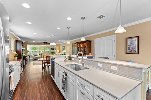 308 Hobby St, Georgetown, TX 78633 - kitchen featuring a sink, open floor plan, a kitchen island with sink, recessed lighting, and dark wood-style floors