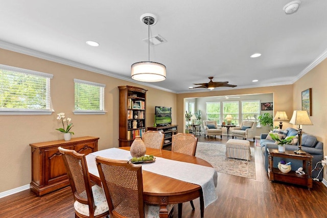 308 Hobby St, Georgetown, TX 78633 - dining room featuring dark wood-type flooring, crown molding, ceiling fan, baseboards, and recessed lighting