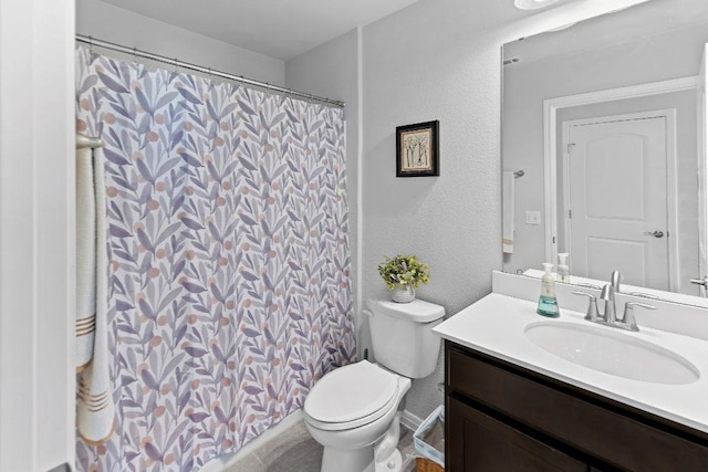 308 Hobby St, Georgetown, TX 78633 - bathroom featuring toilet, vanity, a textured wall, and a shower with curtain