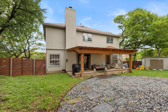 6301 Harrogate Dr, Austin, TX 78759 - back of property featuring a chimney, a patio area, and an outdoor hangout area