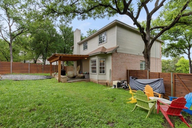 6301 Harrogate Dr, Austin, TX 78759 - back of house featuring a chimney, a patio, and brick siding