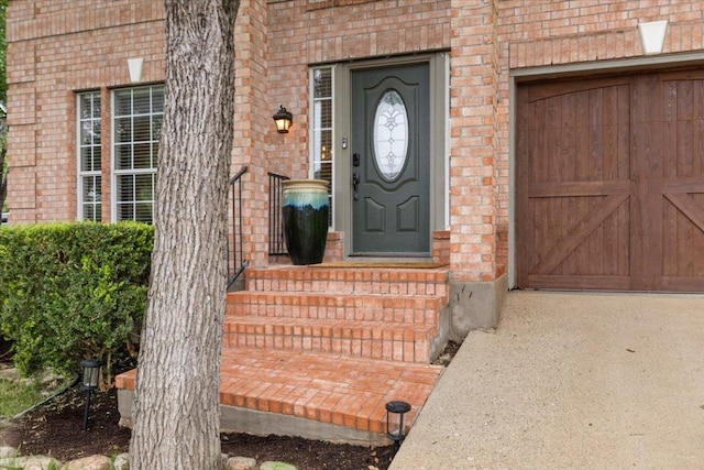 6301 Harrogate Dr, Austin, TX 78759 - property entrance with brick siding and driveway