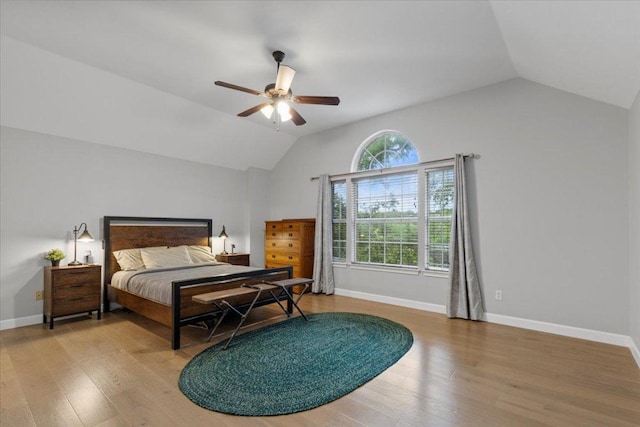 6301 Harrogate Dr, Austin, TX 78759 - bedroom with vaulted ceiling, wood finished floors, baseboards, and ceiling fan