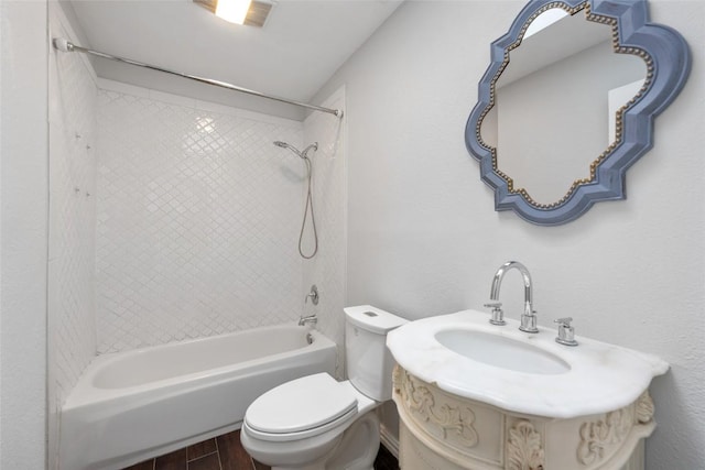 11708 Hornsby Dr, Austin, TX 78753 - full bathroom featuring  shower combination, toilet, wood finished floors, and vanity