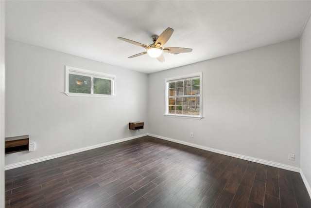 11708 Hornsby Dr, Austin, TX 78753 - empty room with a ceiling fan, baseboards, and dark wood finished floors