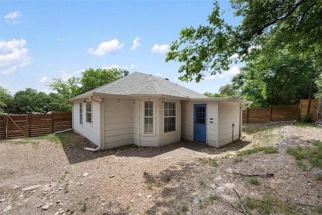 11708 Hornsby Dr, Austin, TX 78753 - back of house featuring roof with shingles