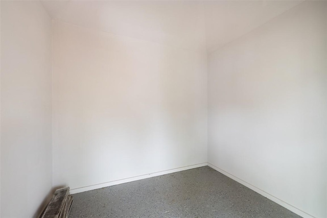 11708 Hornsby Dr, Austin, TX 78753 - empty room with speckle patterned floor and baseboards