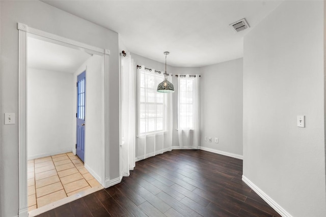 11708 Hornsby Dr, Austin, TX 78753 - unfurnished room with wood finished floors and baseboards