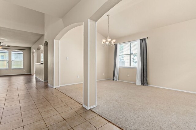 5405 English Oak Dr, Killeen, TX 76542 - empty room featuring light carpet, an inviting chandelier, and plenty of natural light