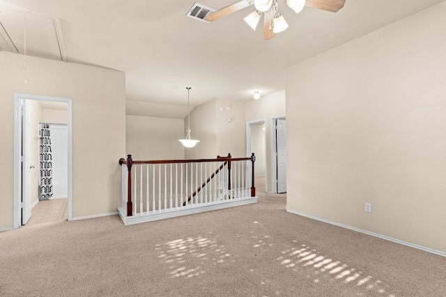 5405 English Oak Dr, Killeen, TX 76542 - spare room featuring ceiling fan, visible vents, carpet floors, attic access, and baseboards