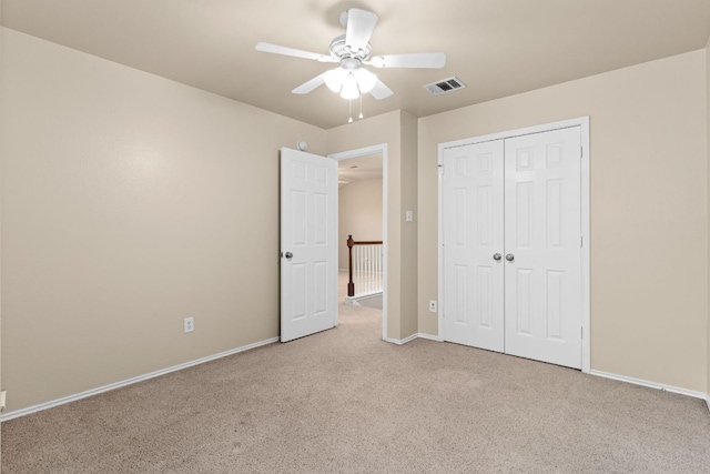 5405 English Oak Dr, Killeen, TX 76542 - unfurnished bedroom with a closet, baseboards, carpet floors, visible vents, and ceiling fan