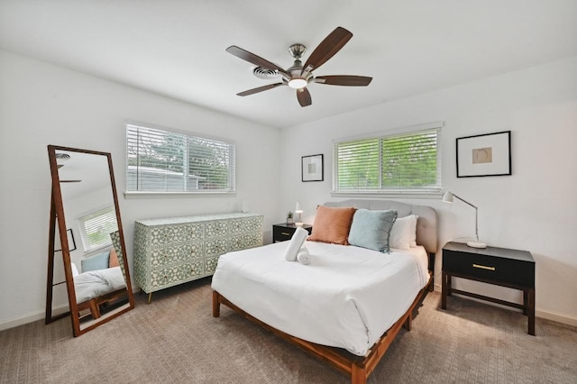 2301 Trafalgar Dr, Austin, TX 78723 - carpeted bedroom featuring ceiling fan and baseboards