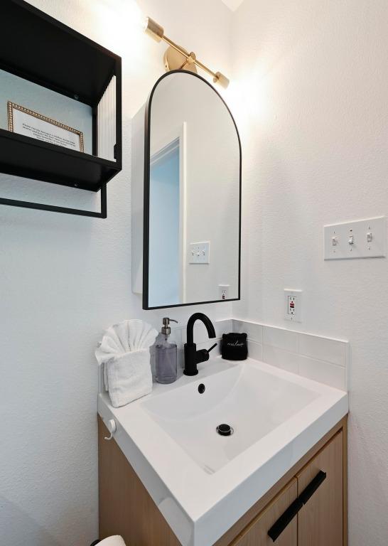 2301 Trafalgar Dr, Austin, TX 78723 - bathroom featuring vanity