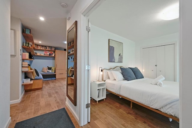 2301 Trafalgar Dr, Austin, TX 78723 - bedroom featuring light wood-style flooring, recessed lighting, and baseboards