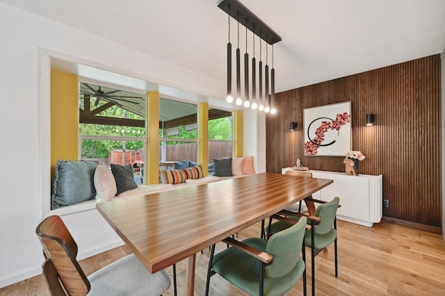 2301 Trafalgar Dr, Austin, TX 78723 - dining space with wood walls and light wood finished floors