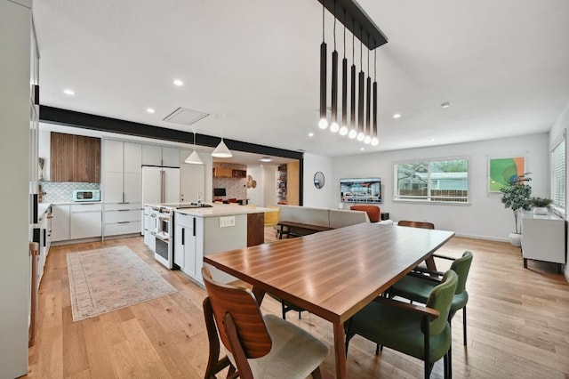 2301 Trafalgar Dr, Austin, TX 78723 - dining space with light wood-type flooring and recessed lighting