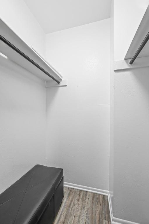 2425 Ashdale Dr Unit 78, Austin, TX 78757 - walk in closet featuring wood finished floors