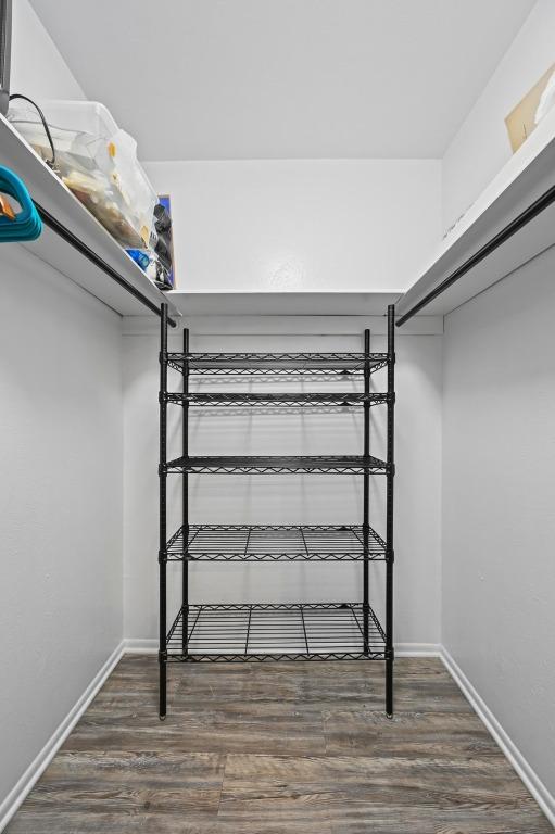2425 Ashdale Dr Unit 78, Austin, TX 78757 - spacious closet with wood finished floors