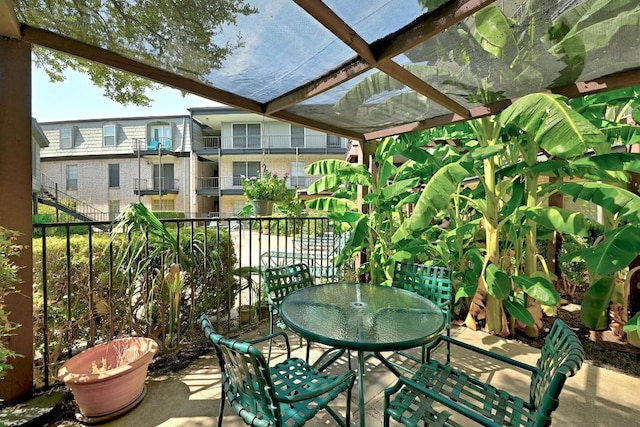 2425 Ashdale Dr Unit 78, Austin, TX 78757 - balcony with outdoor dining space, a patio area, and a pergola