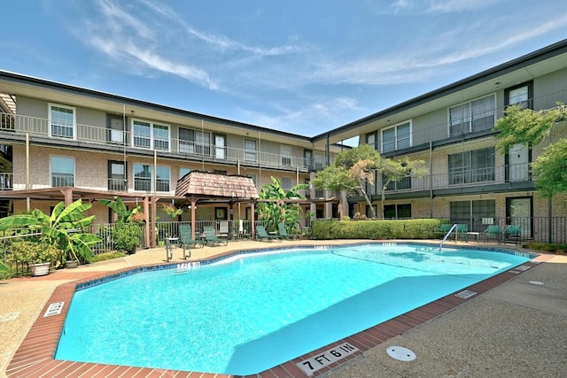 2425 Ashdale Dr Unit 78, Austin, TX 78757 - pool featuring fence and a patio