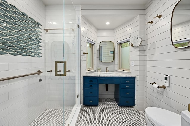 5708 Bullard Dr, Austin, TX 78757 - full bathroom featuring vanity, toilet, tile patterned floors, and a stall shower