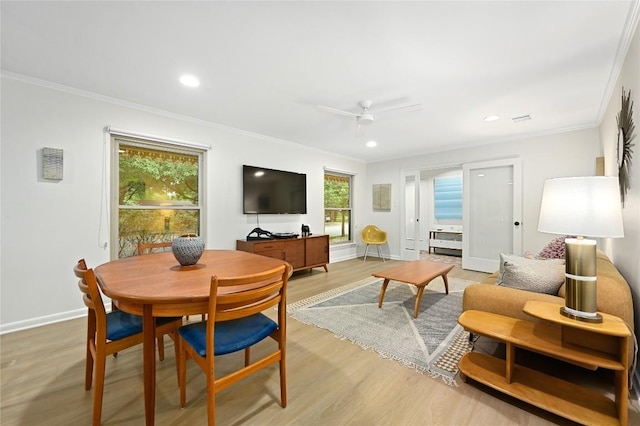5708 Bullard Dr, Austin, TX 78757 - living room featuring crown molding, recessed lighting, baseboards, and light wood-style floors