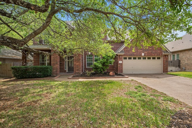 view of front of home with concrete driveway, fence, a garage, and a front lawn