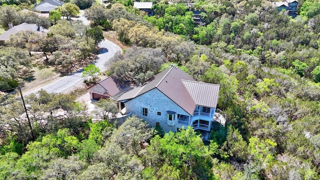 515 Coventry Rd, Spicewood, TX 78669 - view of subject property featuring a forest