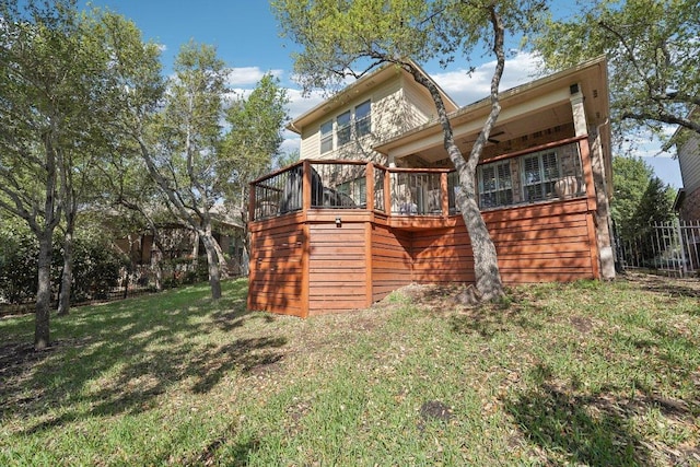 back of property featuring a yard
