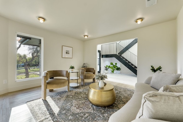 9909 Oliver Dr, Austin, TX 78736 - living room with stairway, wood finished floors, and baseboards