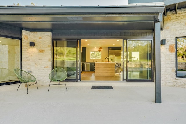 9909 Oliver Dr, Austin, TX 78736 - property entrance with stone siding