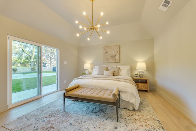 9909 Oliver Dr, Austin, TX 78736 - bedroom featuring access to outside, light wood finished floors, a chandelier, and lofted ceiling