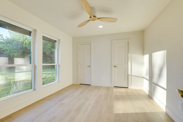 9909 Oliver Dr, Austin, TX 78736 - empty room featuring light wood-style flooring, recessed lighting, and a ceiling fan