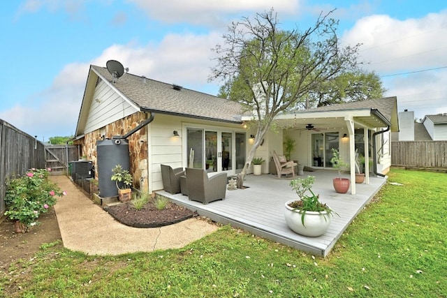6567 Fair Valley Trl, Austin, TX 78749 - rear view of property featuring a ceiling fan, a fenced backyard, a deck, and roof with shingles