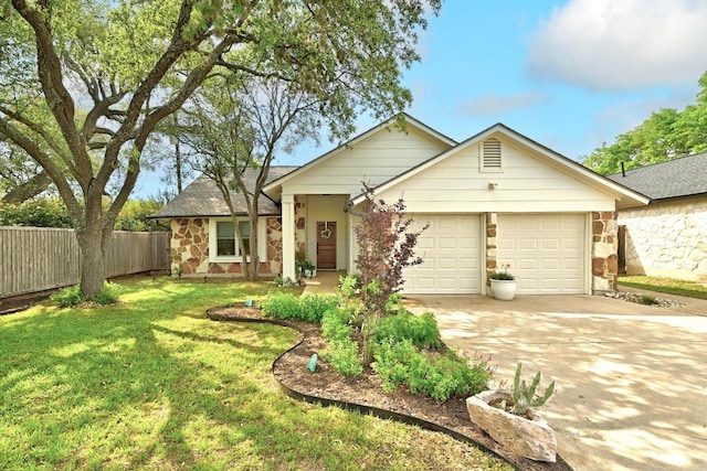 6567 Fair Valley Trl, Austin, TX 78749 - single story home featuring an attached garage, concrete driveway, and stone siding