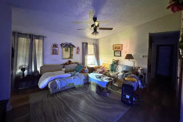 5501 Hibiscus Dr, Austin, TX 78724 - bedroom featuring a textured ceiling, a ceiling fan, and wood finished floors