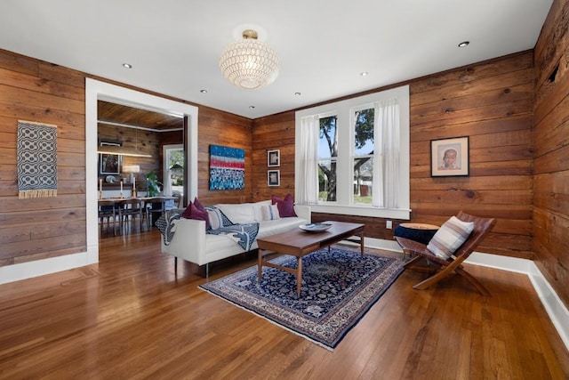 2124 Bluebonnet Ln, Austin, TX 78704 - living room featuring wood walls and wood finished floors
