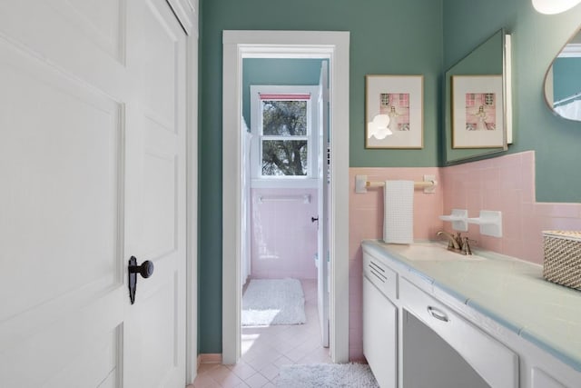 2124 Bluebonnet Ln, Austin, TX 78704 - bathroom featuring tile patterned flooring and vanity