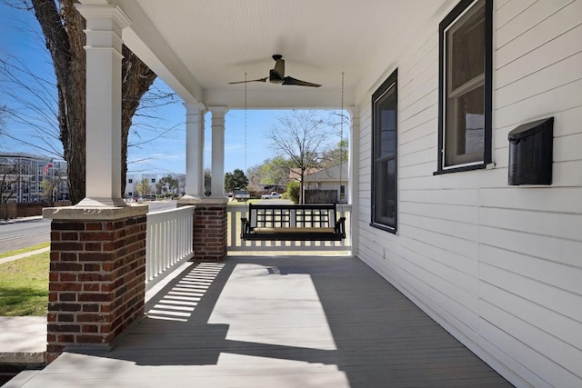 2124 Bluebonnet Ln, Austin, TX 78704 - wooden porch featuring a ceiling fan